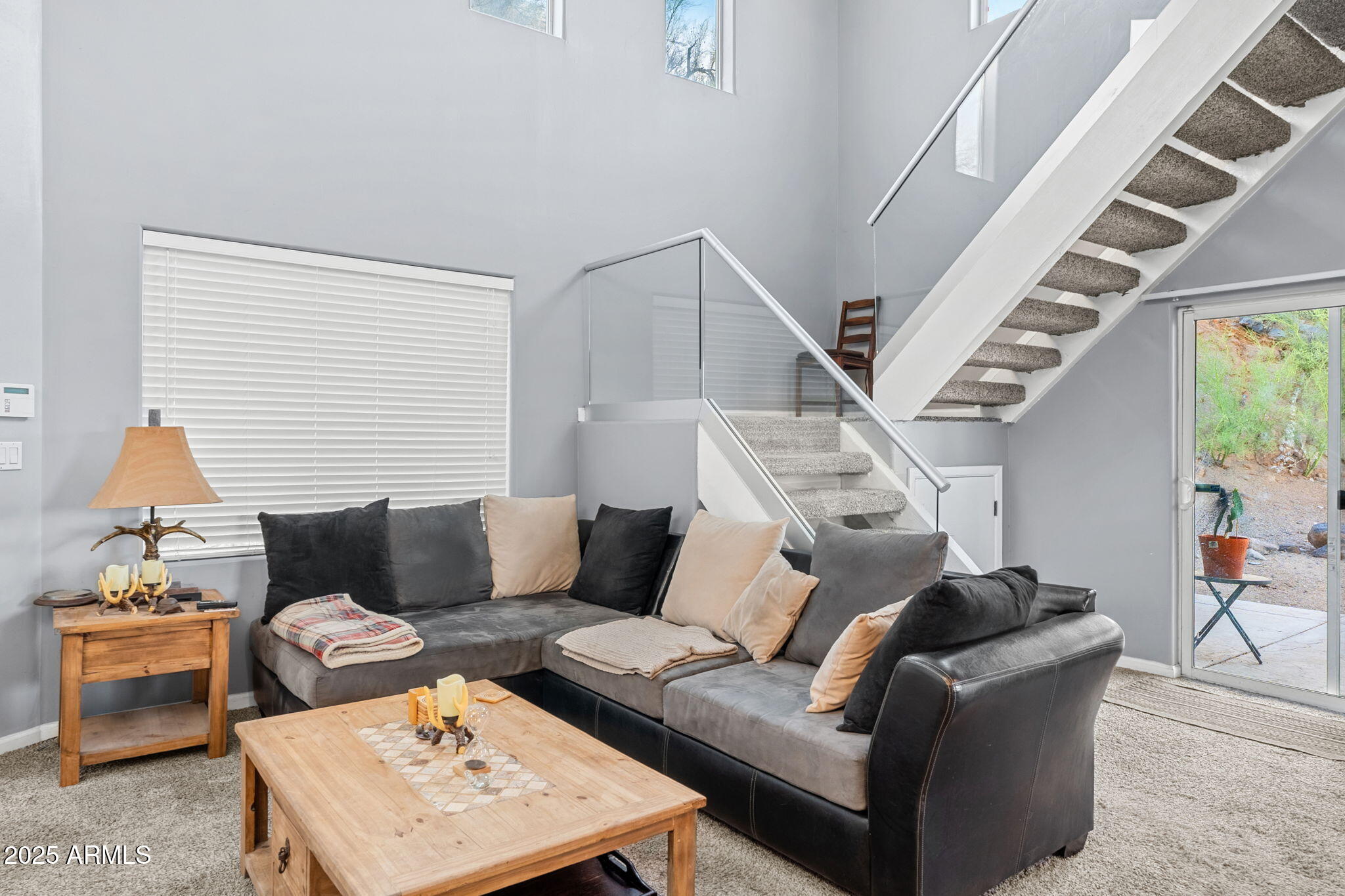 18812 North 22nd Street Phoenix, AZ 85024 - Photo 46 of 71 a living room with furniture and a window