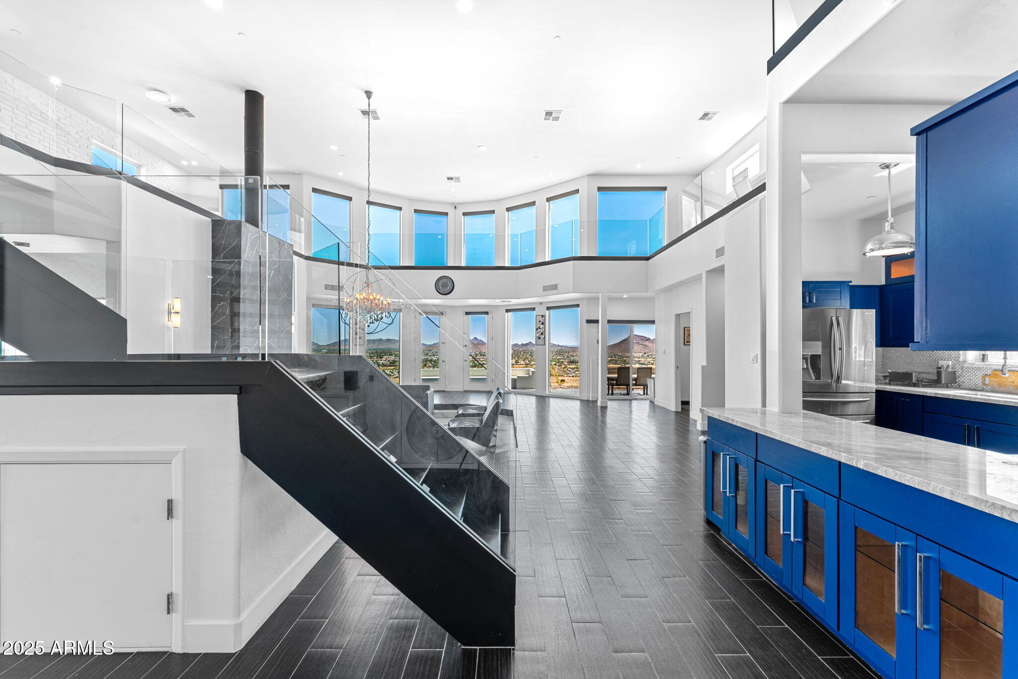 18812 North 22nd Street Phoenix, AZ 85024 - Photo 9 of 71 a kitchen with stainless steel appliances lots of counter top space and wooden floor