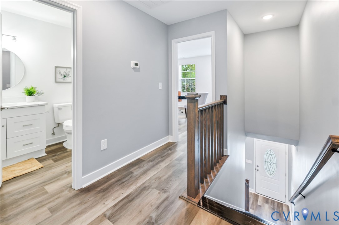 710 Harding Street Petersburg, VA 23803 - Photo 20 of 41 Hallway with an upstairs landing, light wood-type