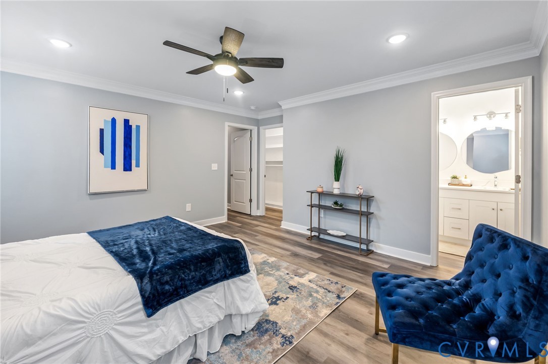 710 Harding Street Petersburg, VA 23803 - Photo 22 of 41 2nd Floor Primary Bedroom with crown molding, wood