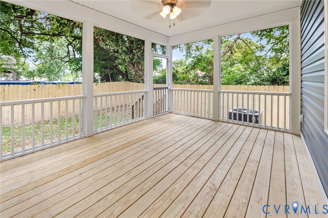 710 Harding Street Petersburg, VA 23803 - Photo 34 of 41 Wooden terrace with ceiling fan, a sunroom, and a