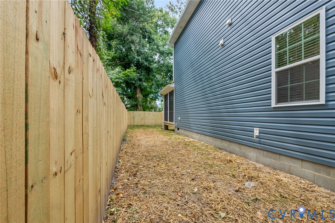 710 Harding Street Petersburg, VA 23803 - Photo 38 of 41 View of home's exterior with a fenced backyard and