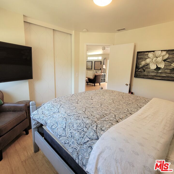 110 Canada Street Ojai, CA 93023 - Photo 14 of 36 a bedroom with a bed and couch