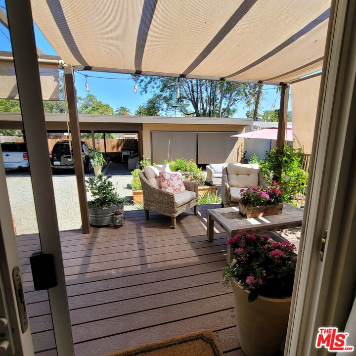 110 Canada Street Ojai, CA 93023 - Photo 23 of 36 a living room with furniture and a fireplace