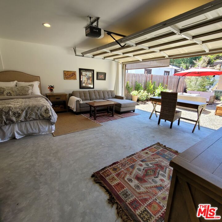 110 Canada Street Ojai, CA 93023 - Photo 27 of 36 a bedroom with furniture and a window