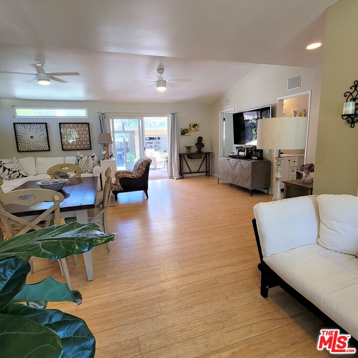 110 Canada Street Ojai, CA 93023 - Photo 7 of 36 a living room with furniture and a wooden floor