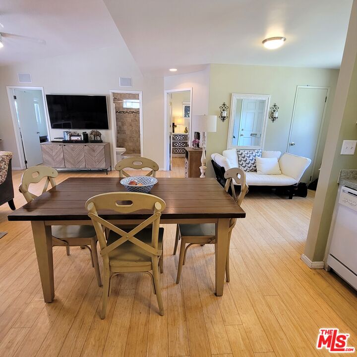 110 Canada Street Ojai, CA 93023 - Photo 8 of 36 a view of a dining room with furniture and wooden floor