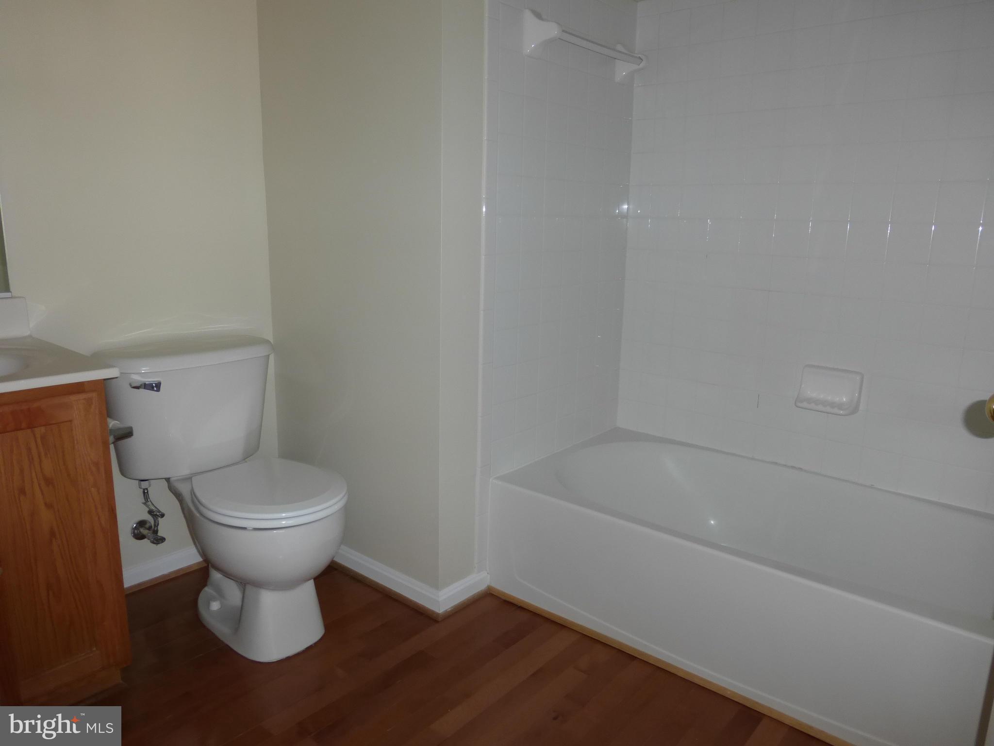 650 Wild Hunt Road Frederick, MD 21703 - Photo 11 of 14 a bathroom with a toilet and a bathtub