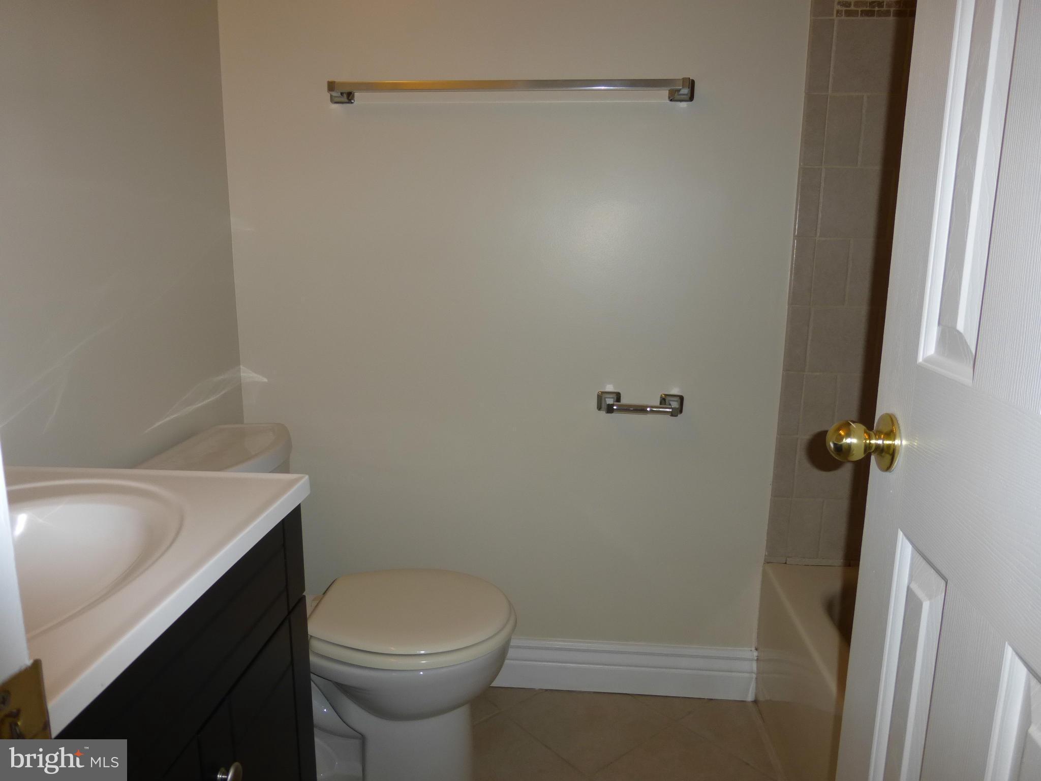 650 Wild Hunt Road Frederick, MD 21703 - Photo 13 of 14 a bathroom with a sink toilet and shower