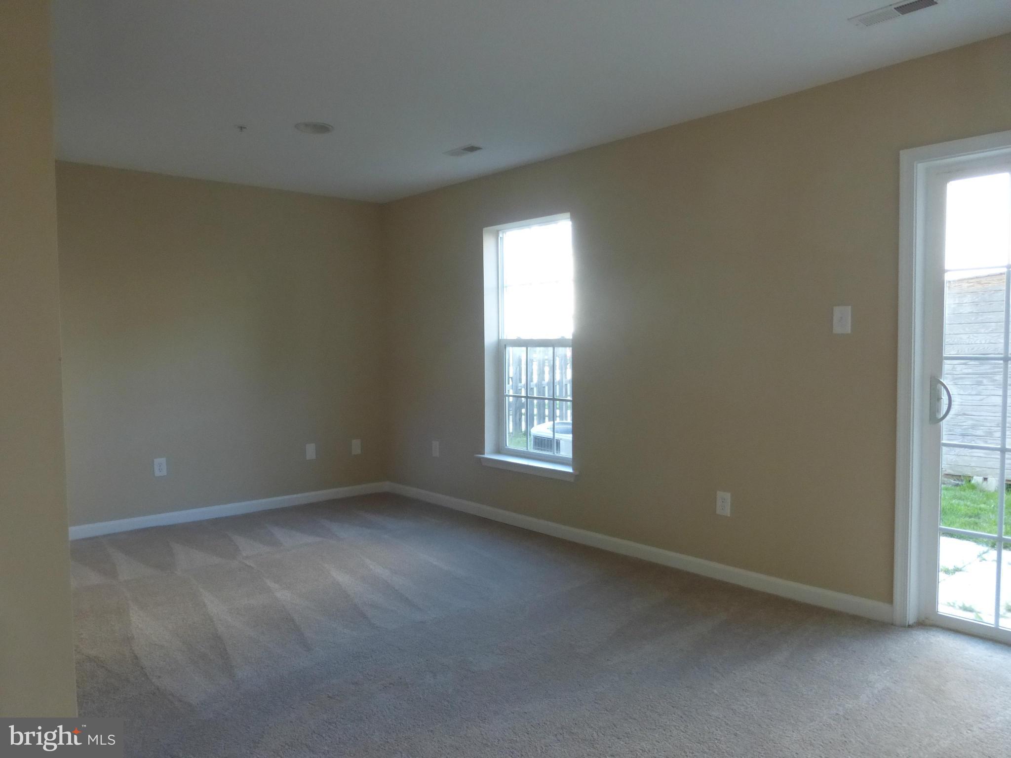 650 Wild Hunt Road Frederick, MD 21703 - Photo 6 of 14 a view of an empty room with a window