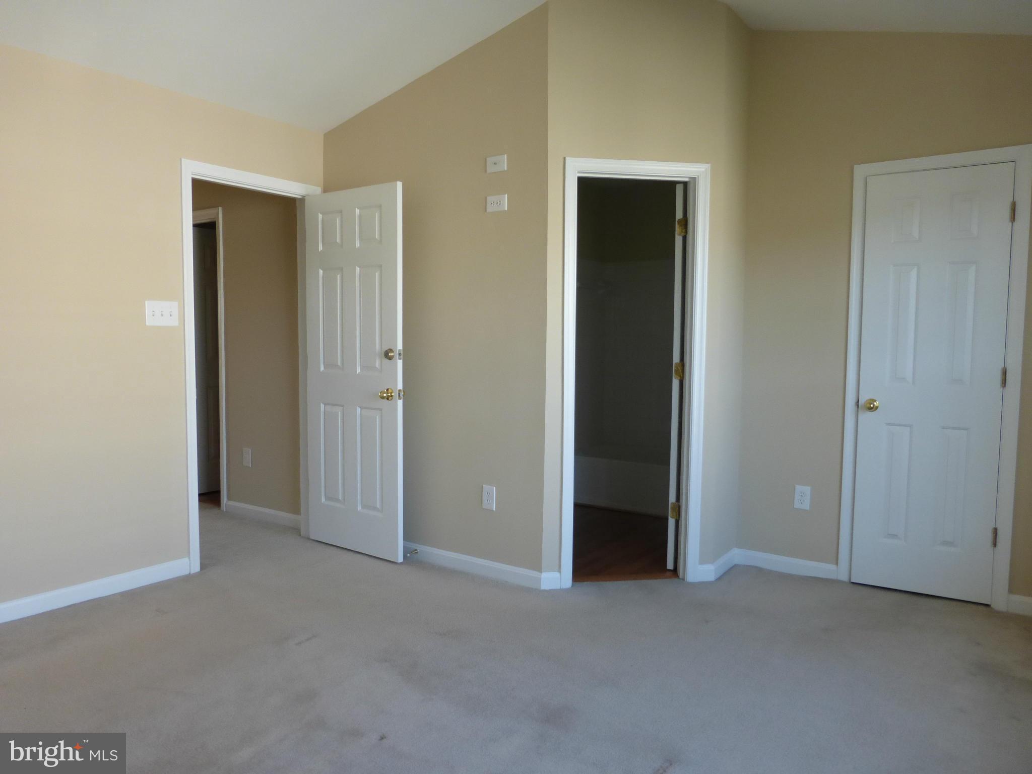 650 Wild Hunt Road Frederick, MD 21703 - Photo 7 of 14 an empty room with closet and a bathroom