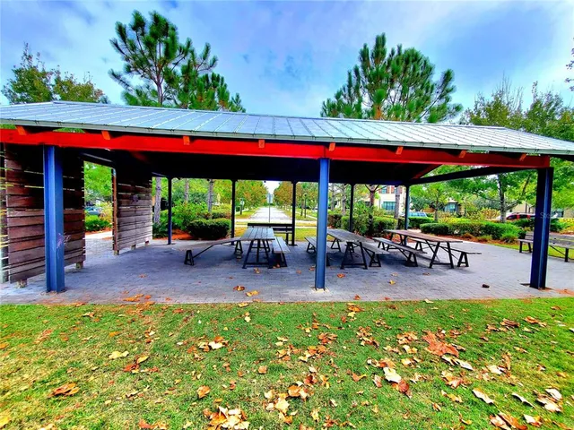 a view of a lake with a yard and green space