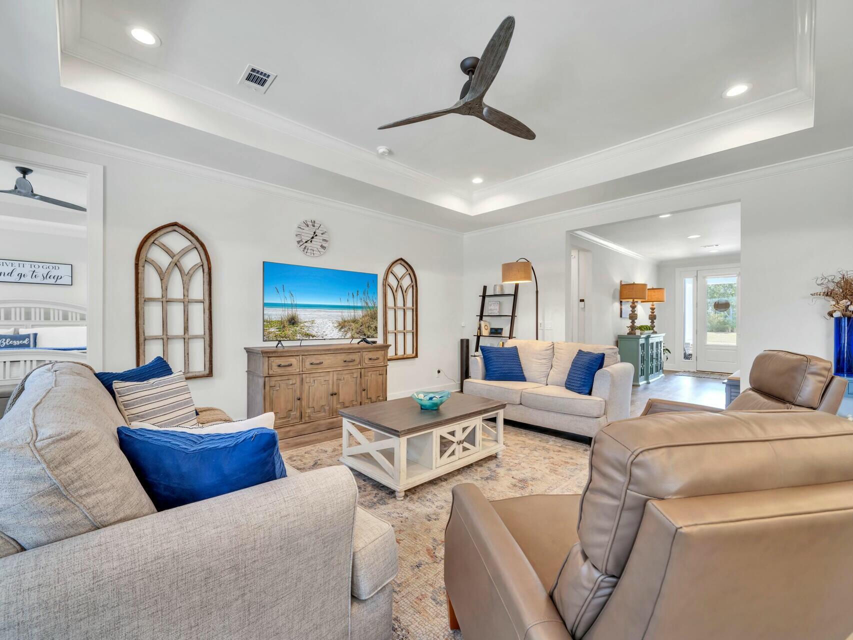 176 Hibernate Way Freeport, FL 32439 - Photo 13 of 66 a living room with furniture and a wooden floor