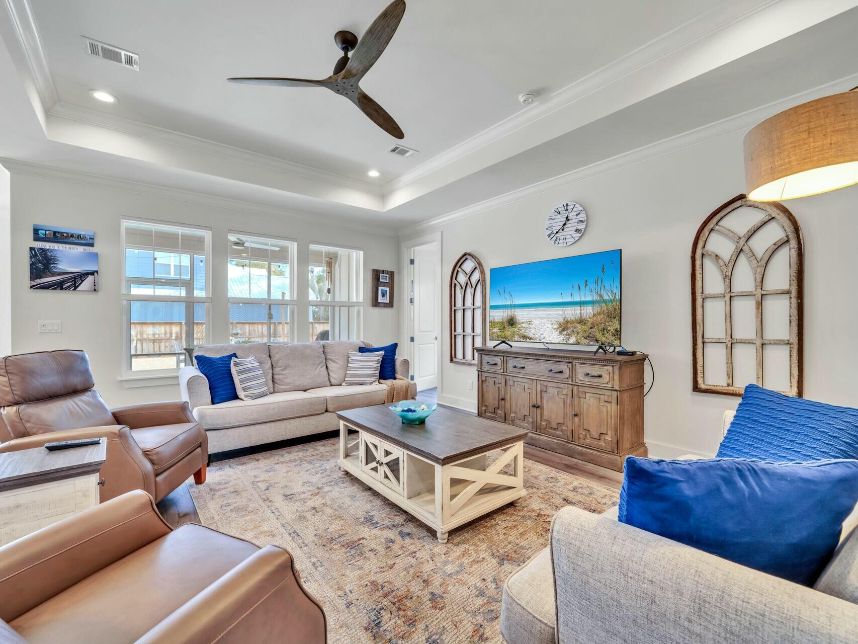 176 Hibernate Way Freeport, FL 32439 - Photo 14 of 66 a living room with furniture and a flat screen tv