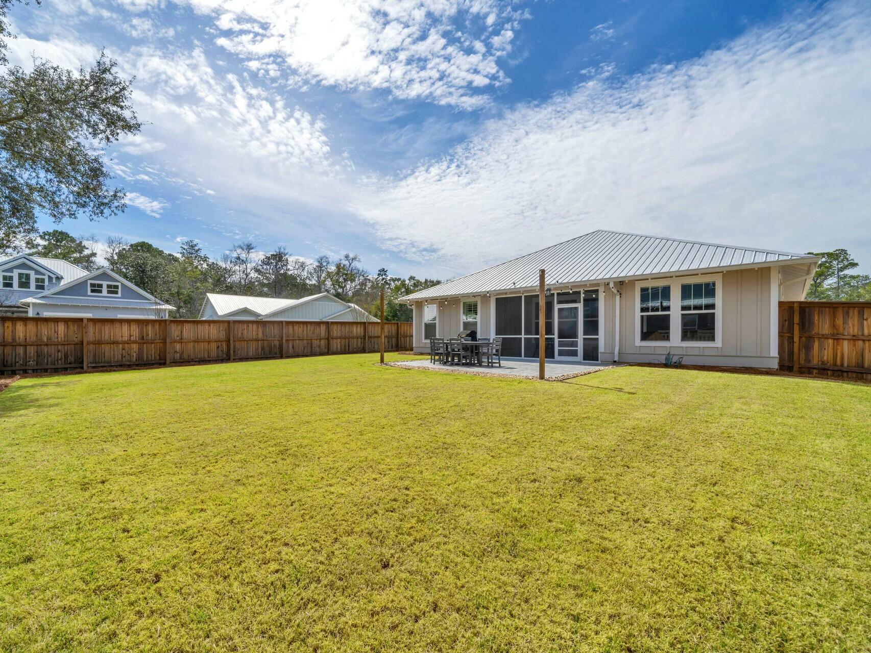 176 Hibernate Way Freeport, FL 32439 - Photo 28 of 66 a view of a house with a swimming pool