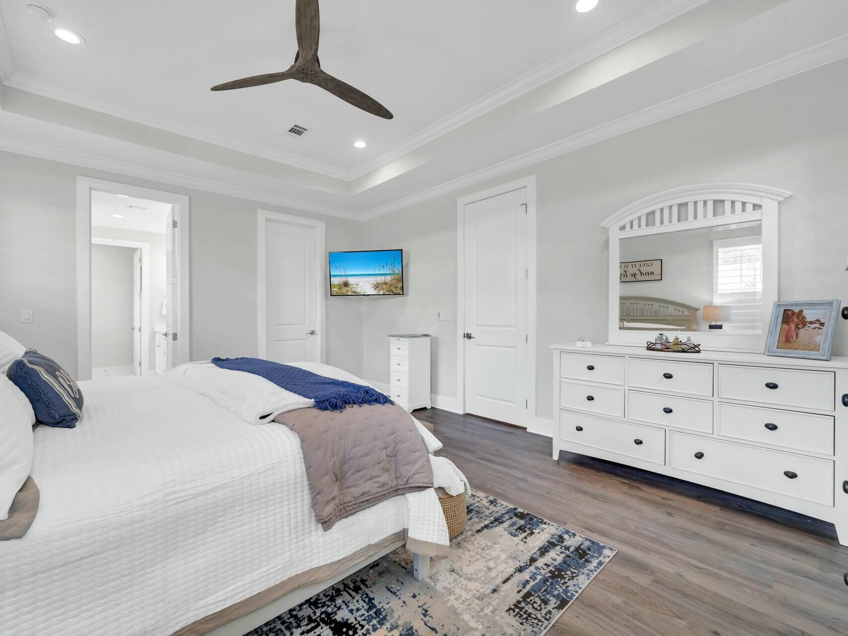 176 Hibernate Way Freeport, FL 32439 - Photo 33 of 66 a bedroom with a bed and a dresser