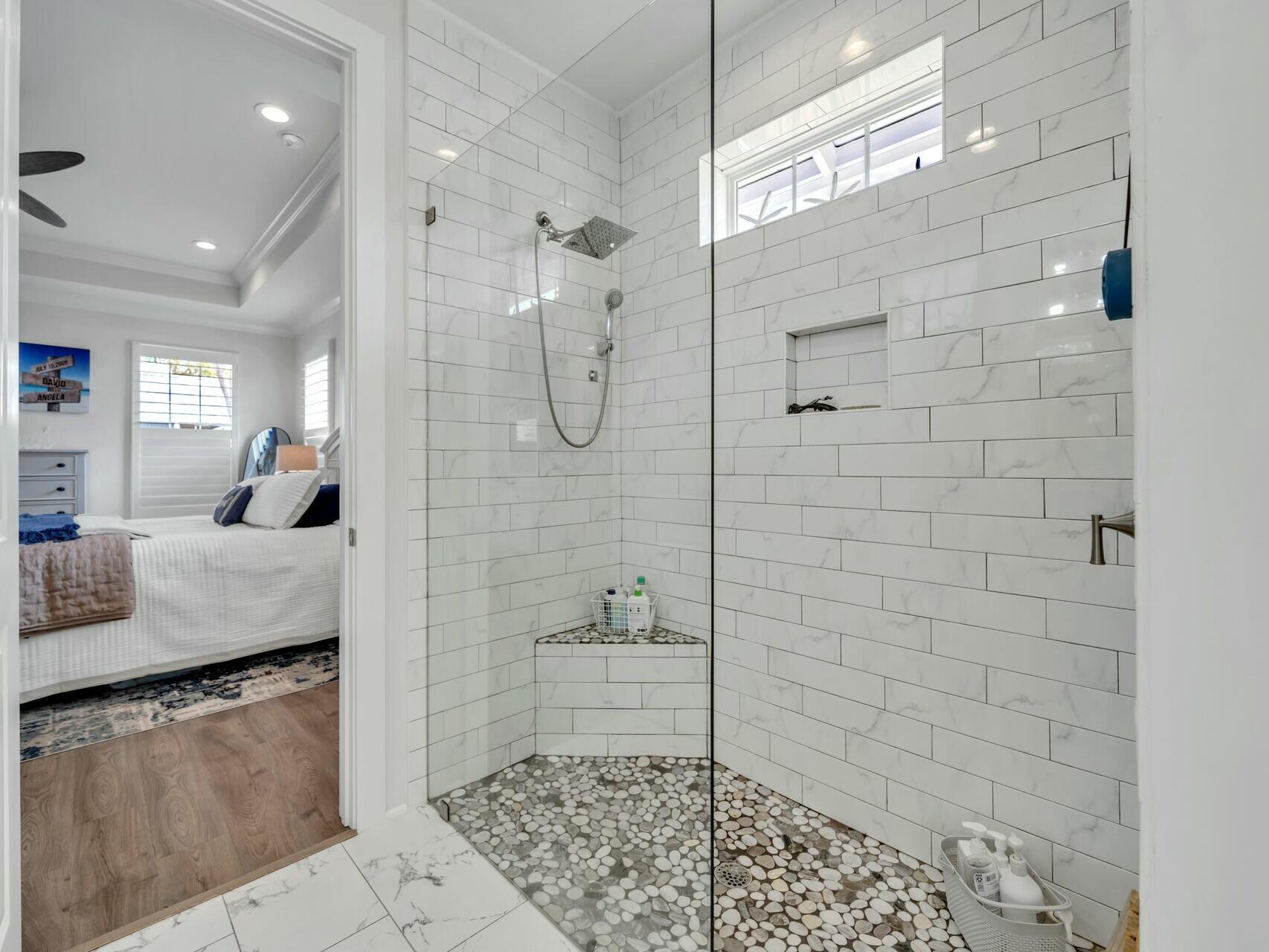 176 Hibernate Way Freeport, FL 32439 - Photo 37 of 66 a bathroom with a sink shower and a mirror