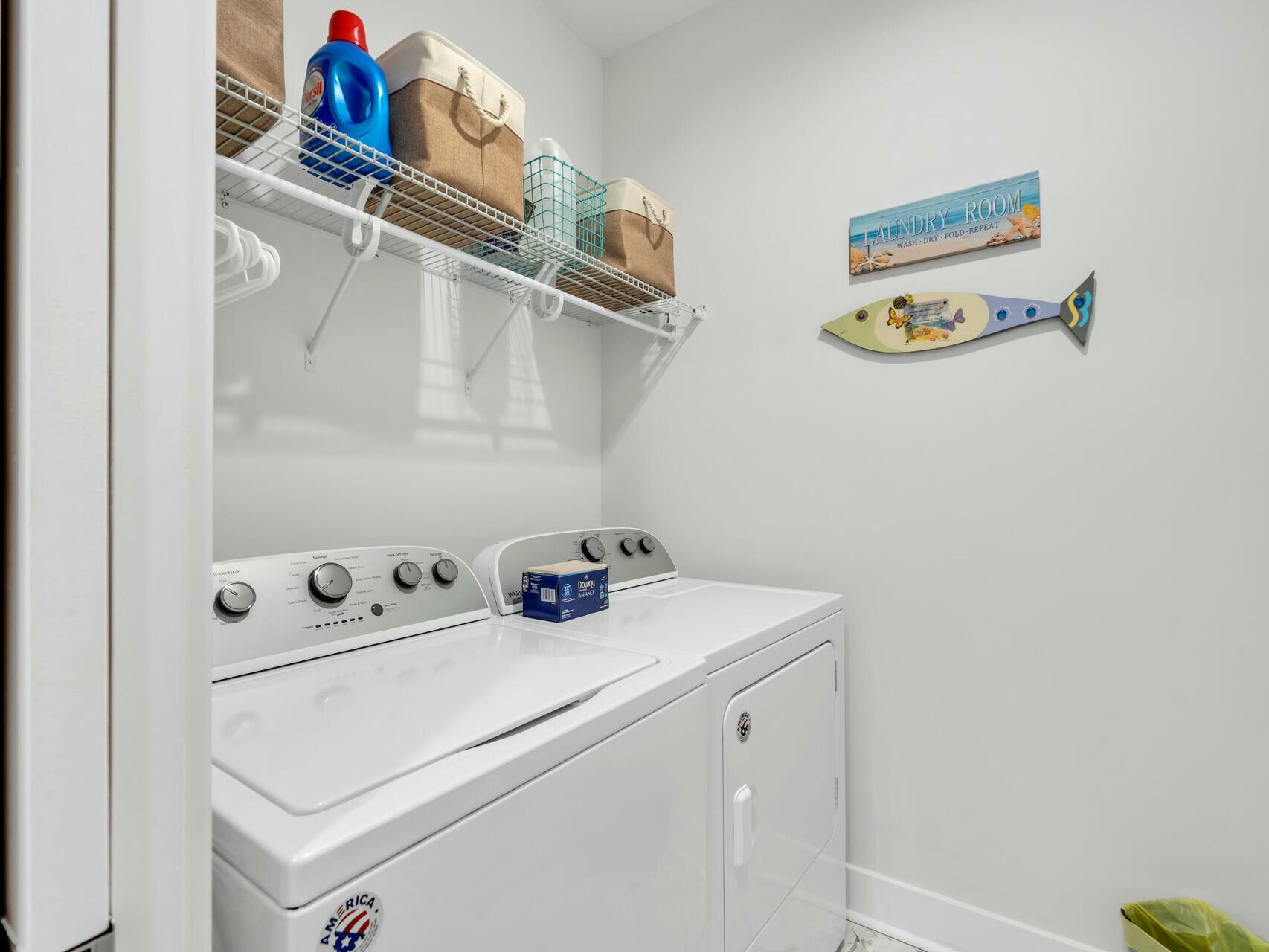 176 Hibernate Way Freeport, FL 32439 - Photo 44 of 66 a utility room with dryer and washer