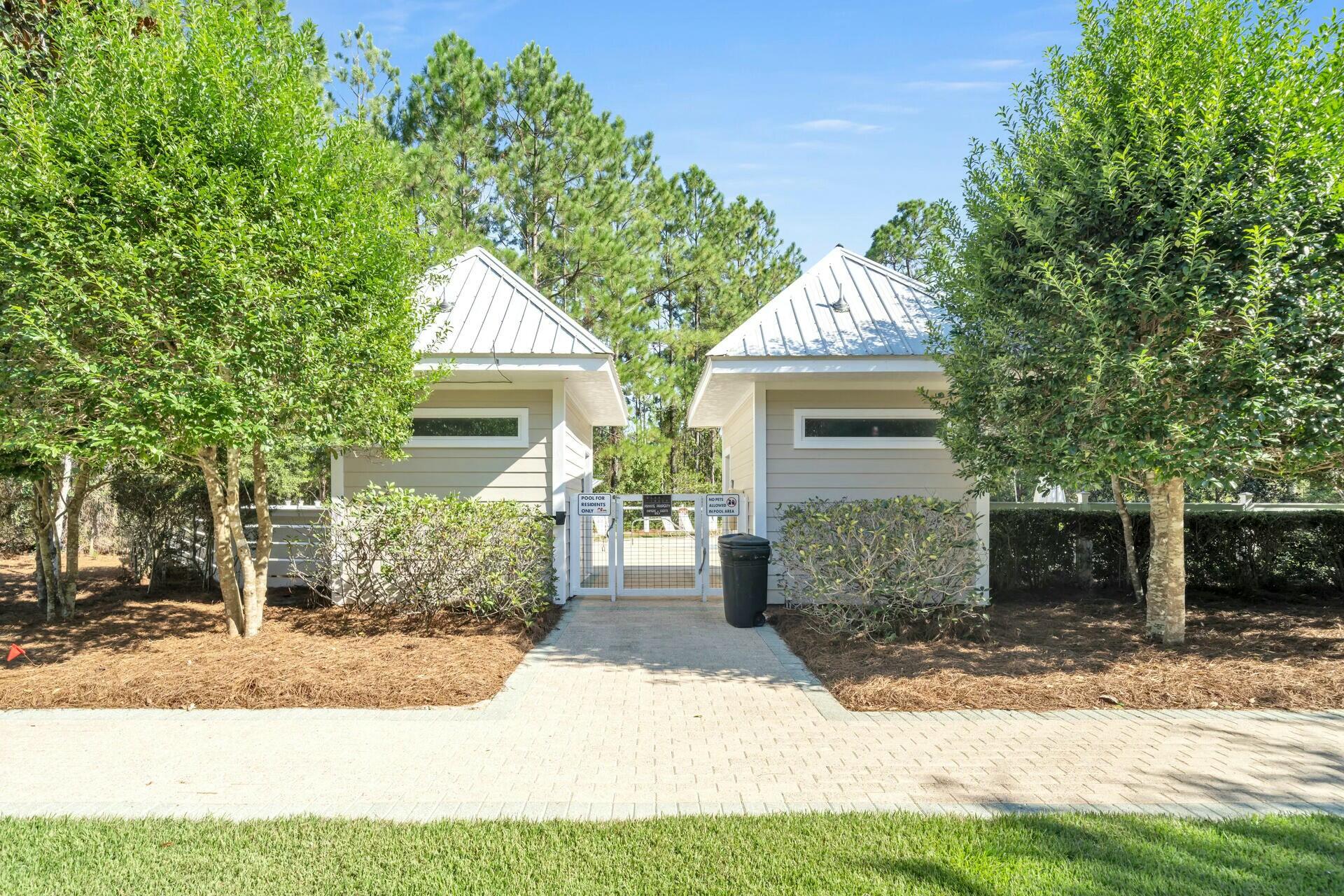176 Hibernate Way Freeport, FL 32439 - Photo 53 of 66 a front view of a house with a yard and garage