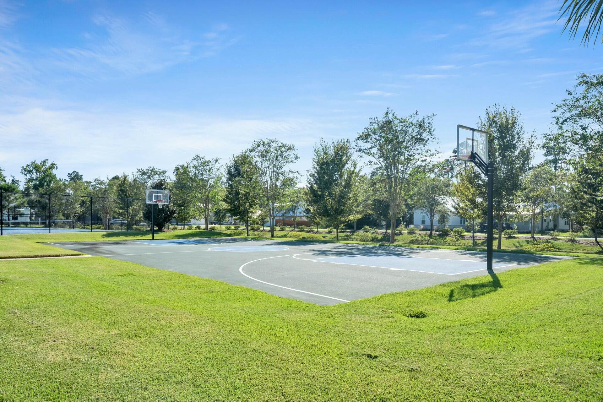 176 Hibernate Way Freeport, FL 32439 - Photo 56 of 66 a view of a playground with basketball court