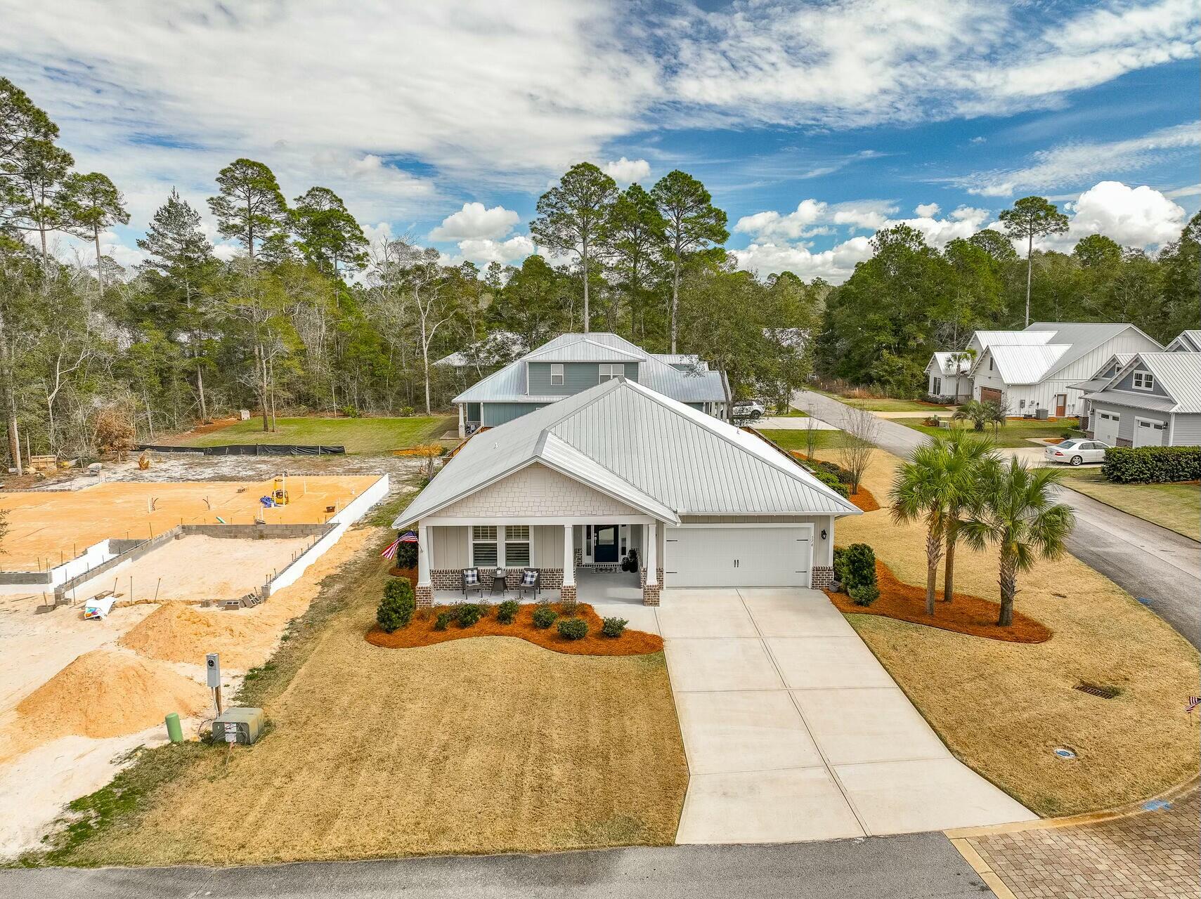 176 Hibernate Way Freeport, FL 32439 - Photo 59 of 66 a aerial view of a house with a yard
