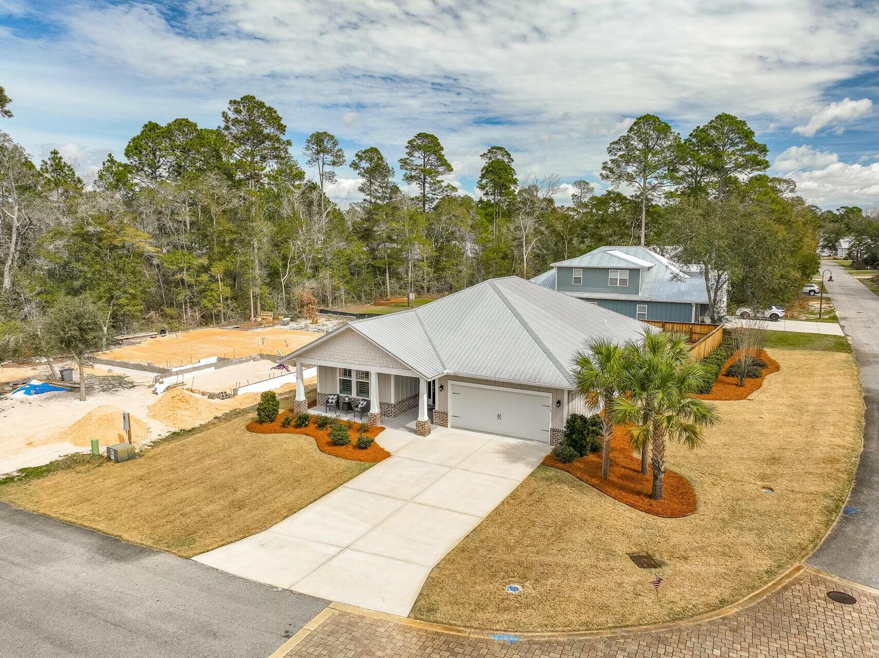 176 Hibernate Way Freeport, FL 32439 - Photo 8 of 66 a view of a swimming pool with an outdoor space