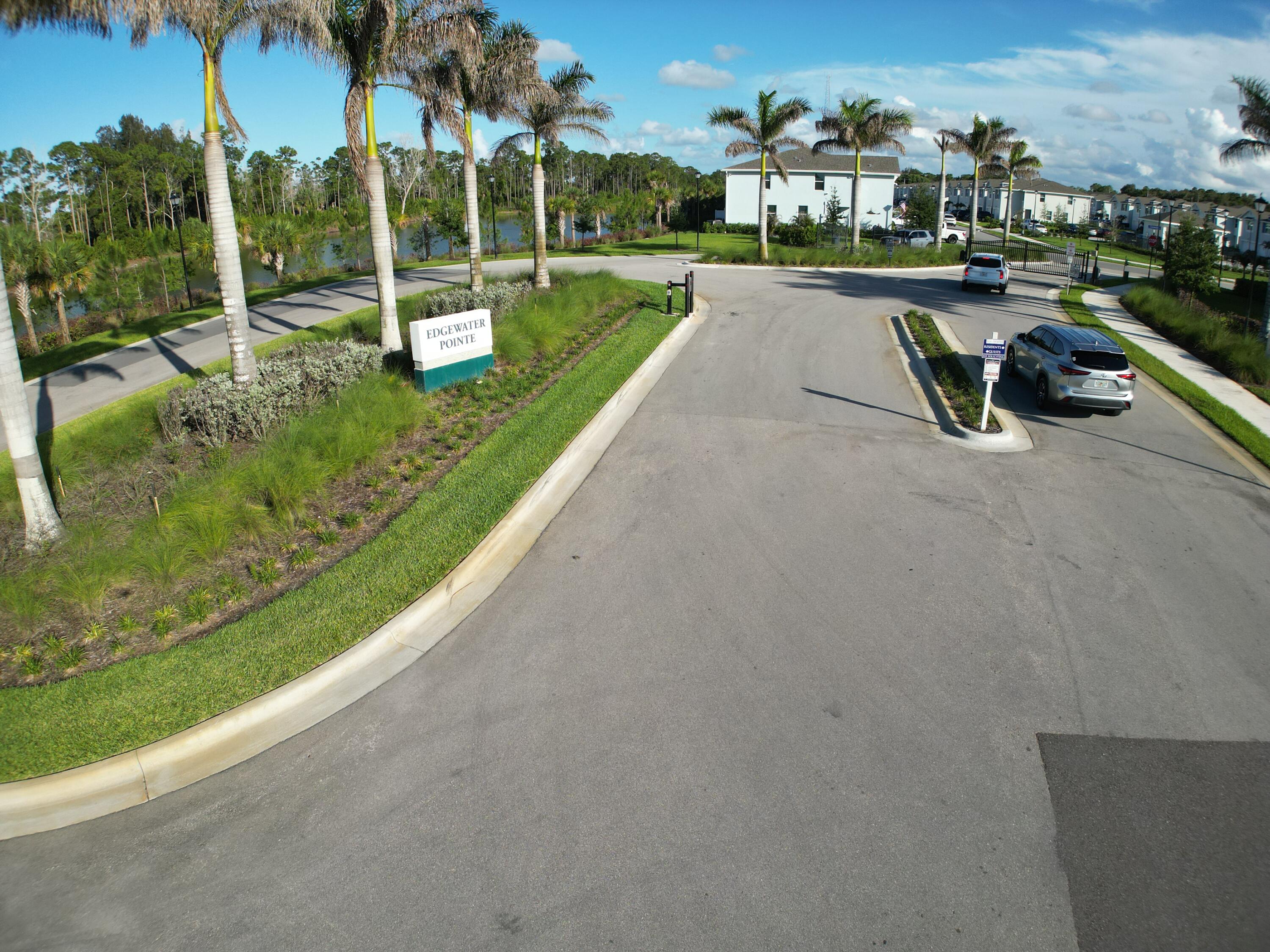 5784 Southeast Edgewater Circle Stuart, FL 34997 - Photo 29 of 33 a view of a park with swings and slides