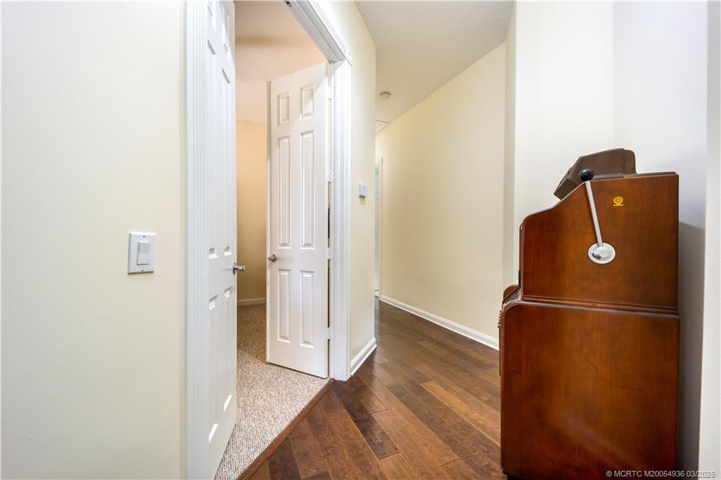1477 Southwest Eagleglen Place Stuart, FL 34997 - Photo 21 of 36 a view of bathroom with a door
