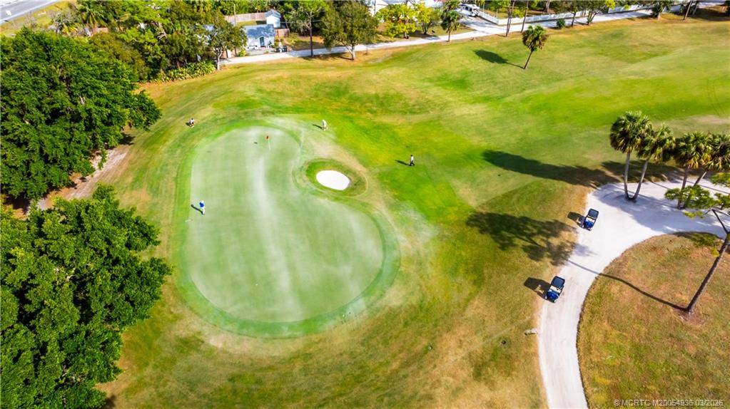 1477 Southwest Eagleglen Place Stuart, FL 34997 - Photo 36 of 36 a view of a swimming pool