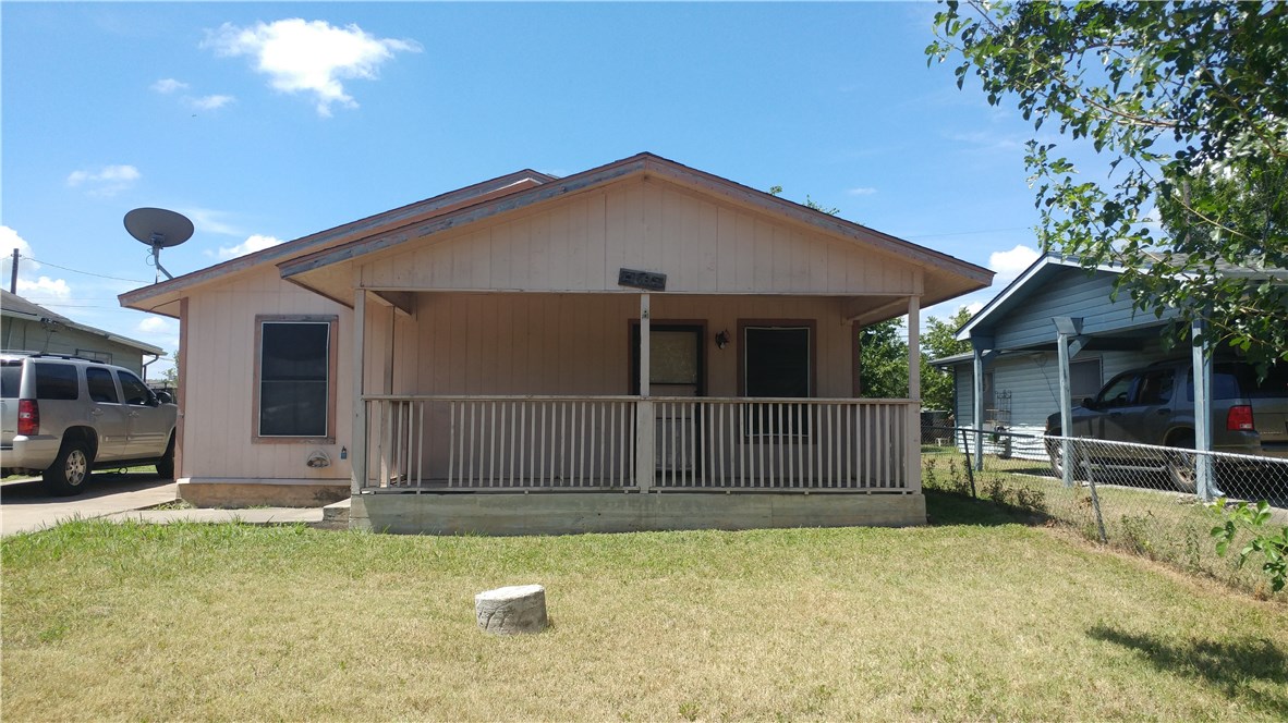 6803 Santos Street Austin, TX 78741 - Photo 1 of 1 a view of a house with a outdoor space