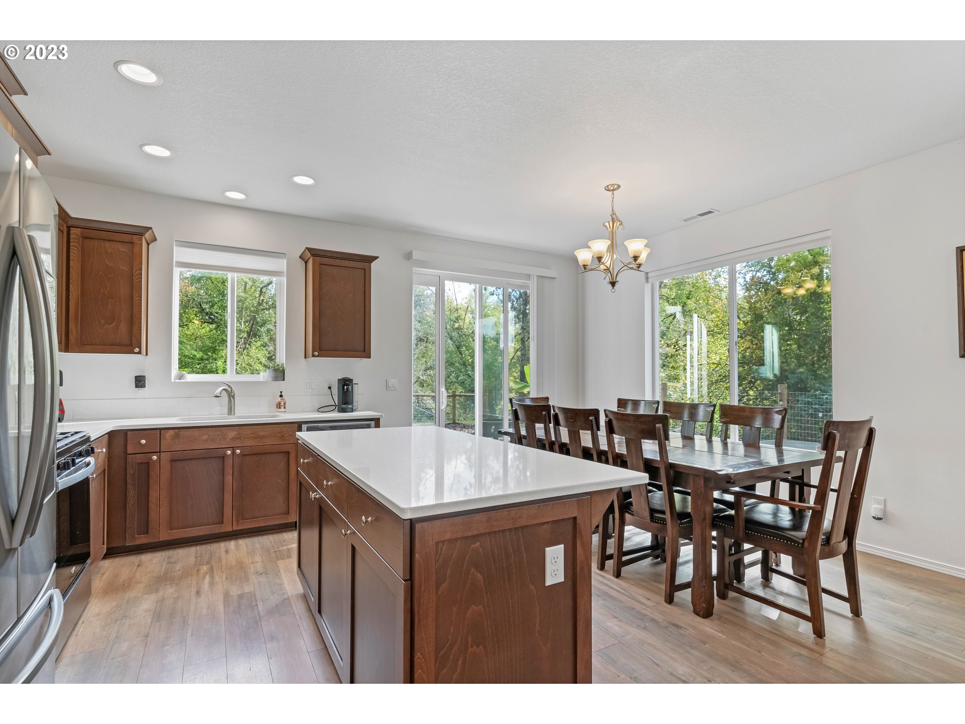 32580 South Needy Road Canby, OR 97013 - Photo 16 of 35 a large kitchen with a table and chairs