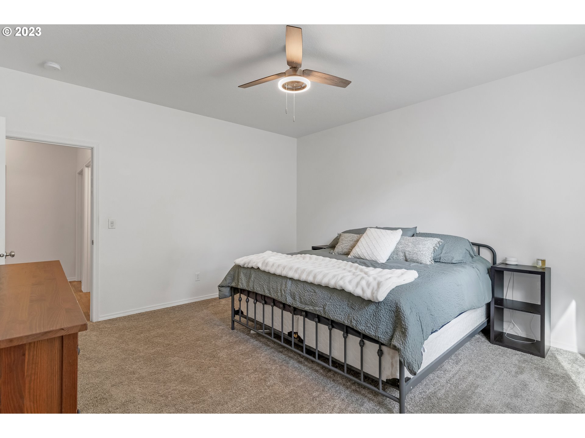 32580 South Needy Road Canby, OR 97013 - Photo 20 of 35 a spacious bedroom with a bed and a dresser