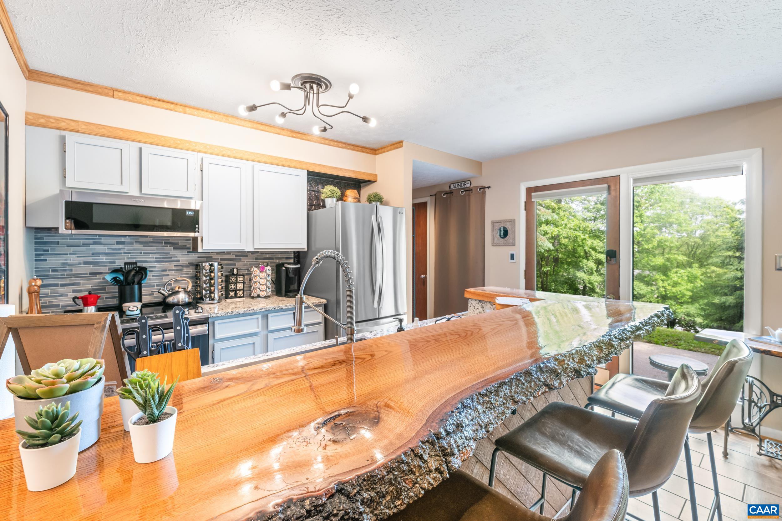 2225 Tanners Ridge Roseland, VA 22967 - Photo 1 of 26 a very nice looking dining room with a large window
