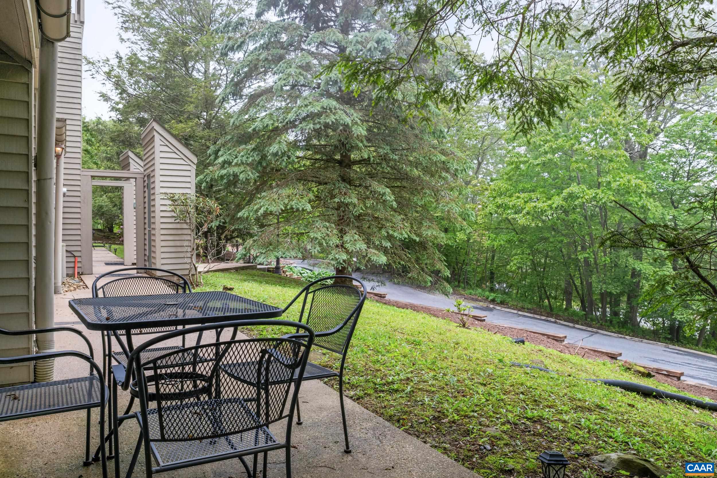 2225 Tanners Ridge Roseland, VA 22967 - Photo 16 of 26 a view of patio with table and chairs and potted plants