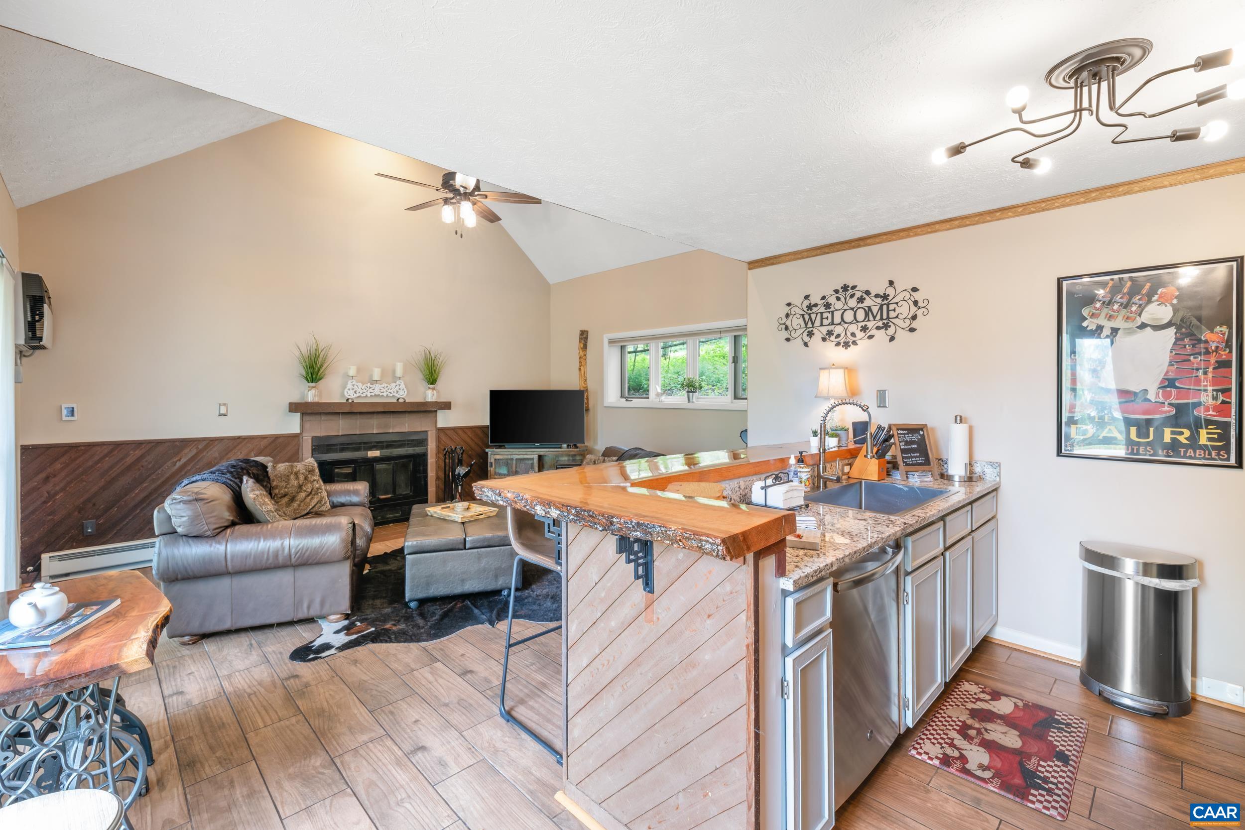 2225 Tanners Ridge Roseland, VA 22967 - Photo 4 of 26 a view of a livingroom with furniture and rug
