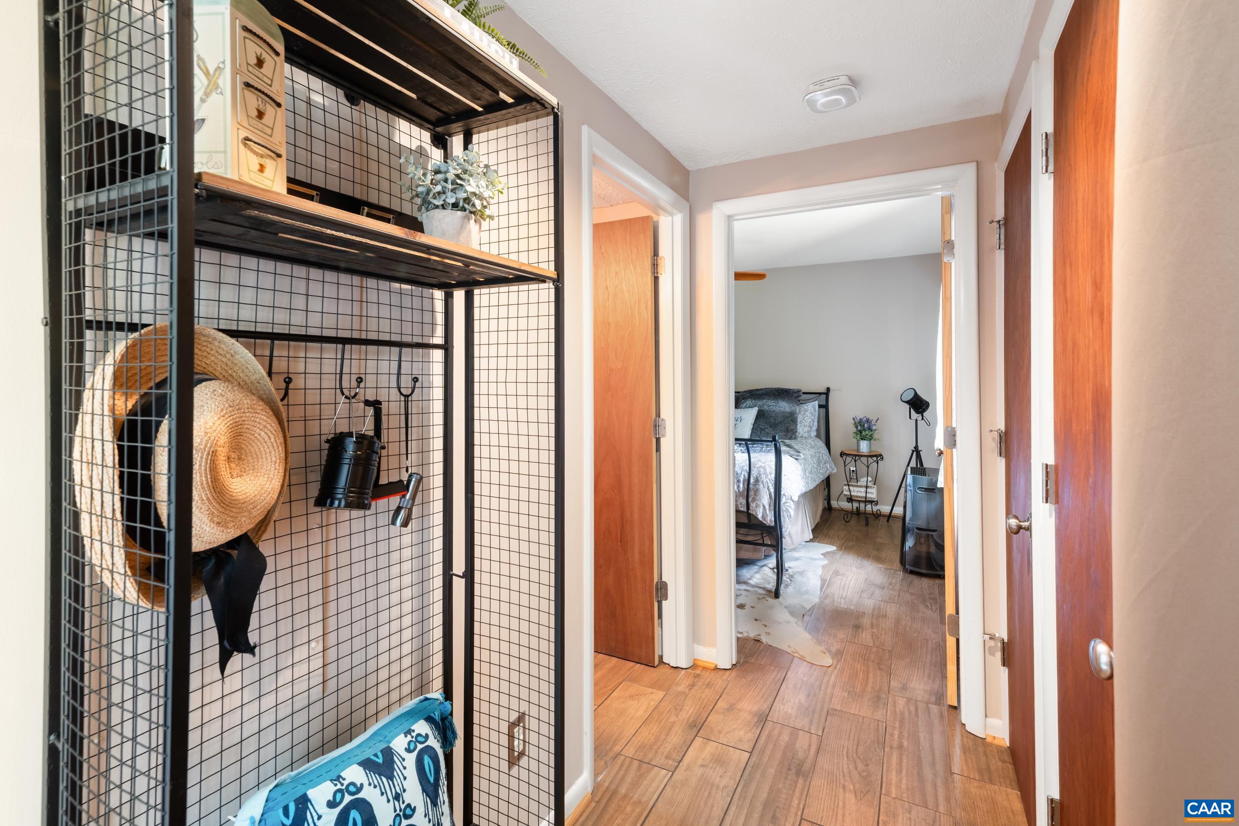 2225 Tanners Ridge Roseland, VA 22967 - Photo 9 of 26 a view of a hallway with wooden floor and windows