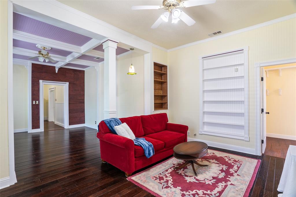 5824 Boone Street Sachse, TX 75048 - Photo 6 of 40 a living room with furniture and a rug