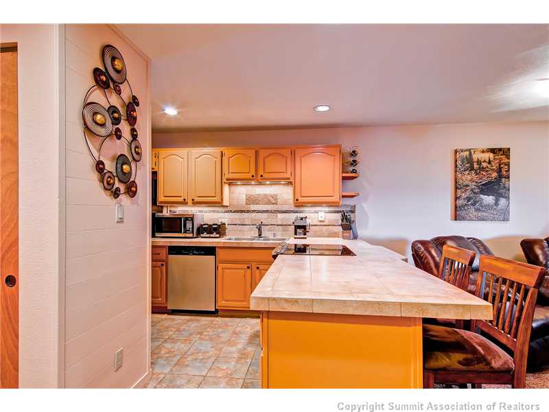 9401 Ryan Gulch Road, Unit 413 Silverthorne, CO 80498 - Photo 4 of 25 Exterior Front.