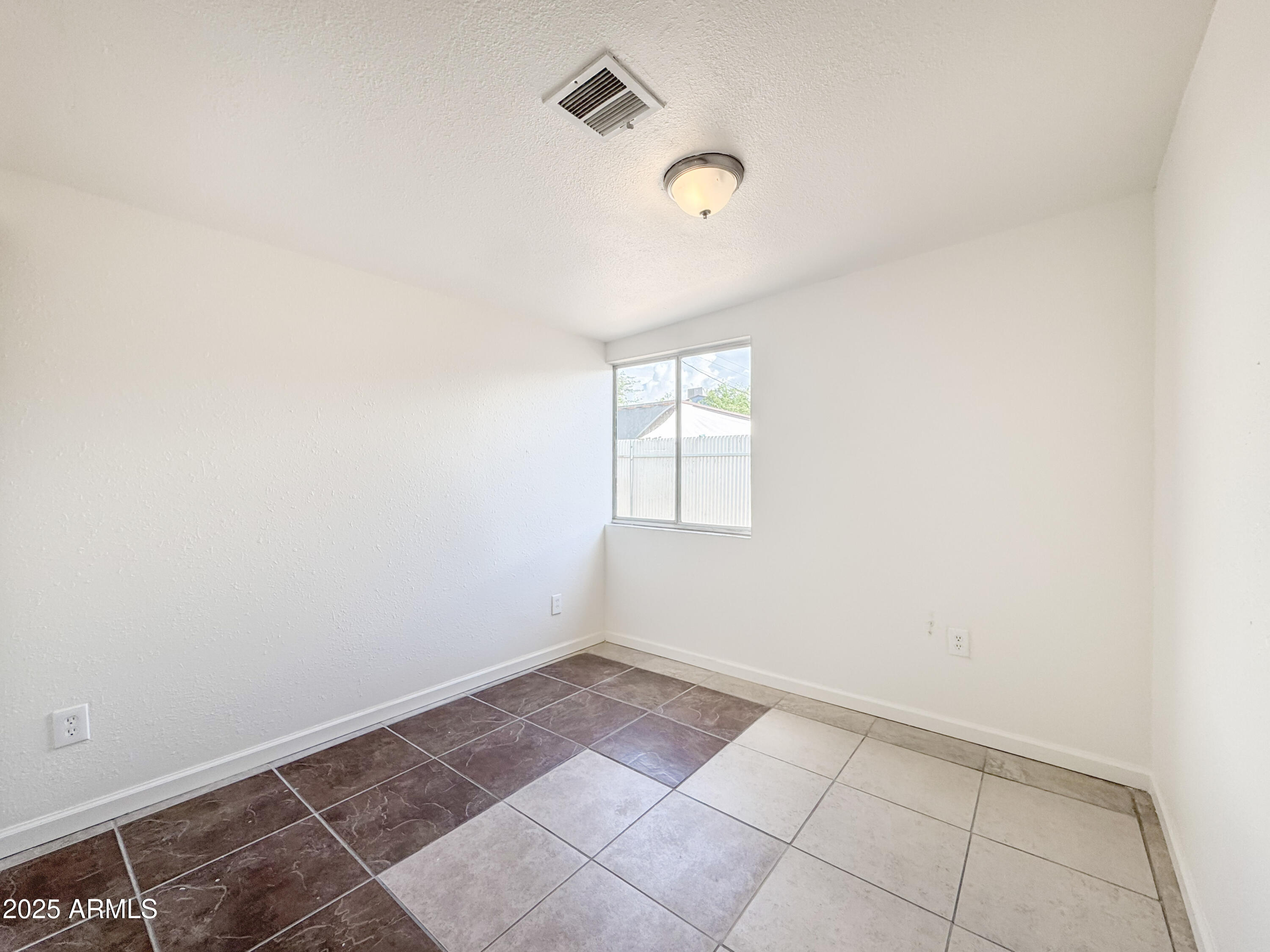 3422 East Culver Street Phoenix, AZ 85008 - Photo 10 of 25 a view of a kitchen with white cabinets