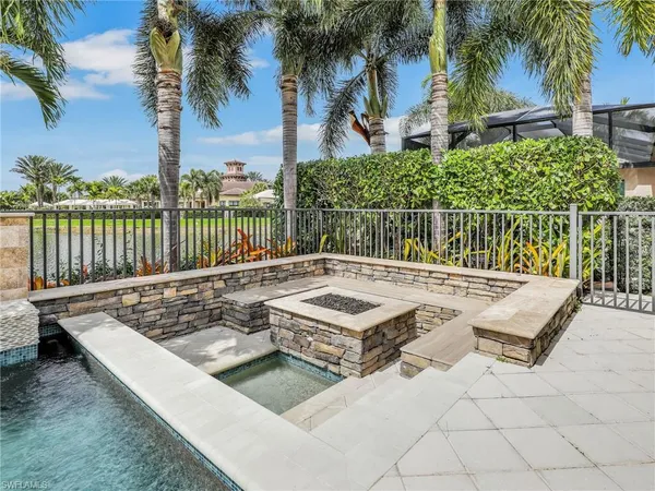 a view of a chairs and table in the patio