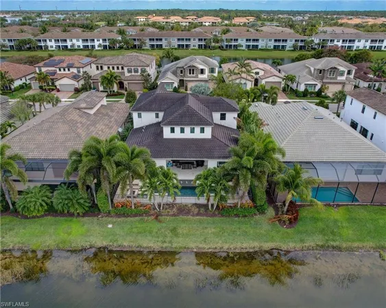 an aerial view of a house with a garden