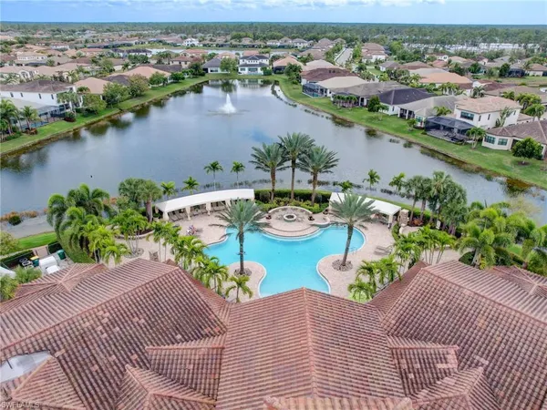 an aerial view of a house with outdoor space