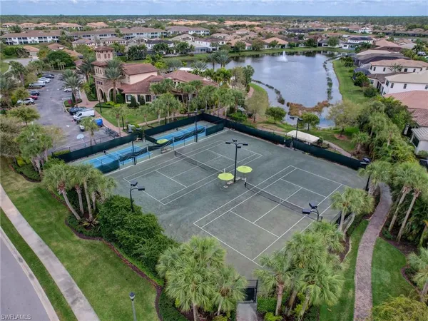 an aerial view of house with yard