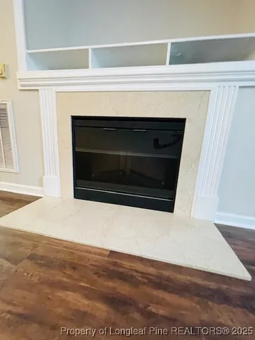 a living room with a fireplace