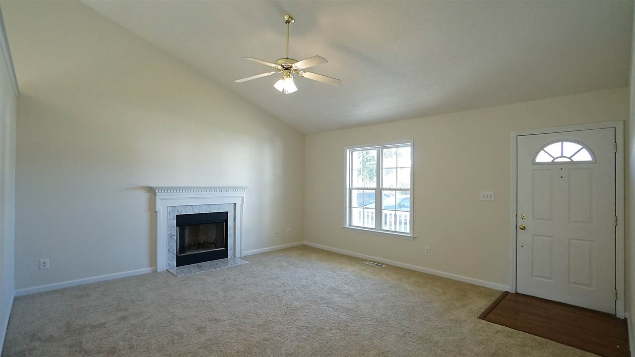 701 Kavkaz Street Raleigh, NC 27610 - Photo 4 of 25 Large Living Room with Cathedral Ceiling