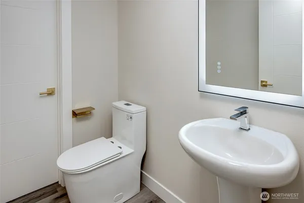 a bathroom with a sink and a toilet