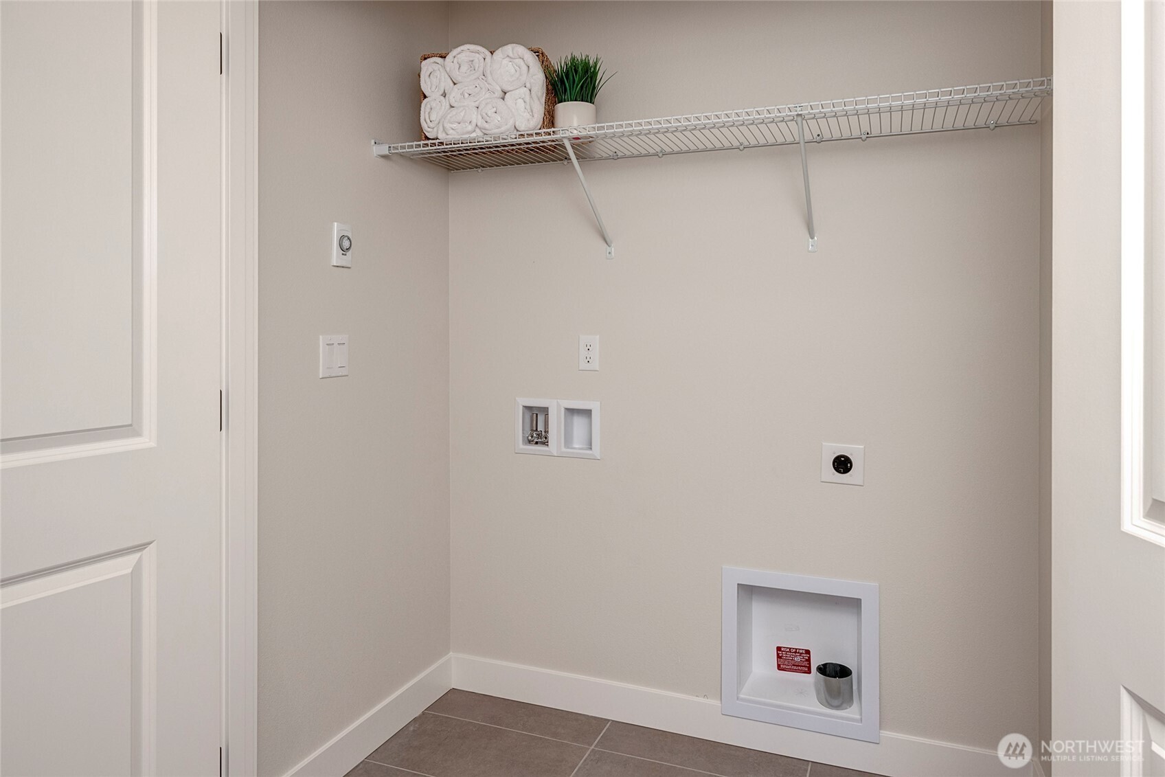 17116 35th Drive Southeast, Unit C6 Bothell, WA 98012 - Photo 13 of 20 a view of a room with shelf