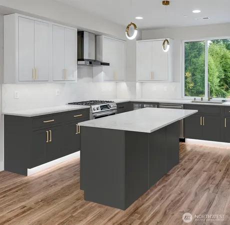 a kitchen with a stove and a sink