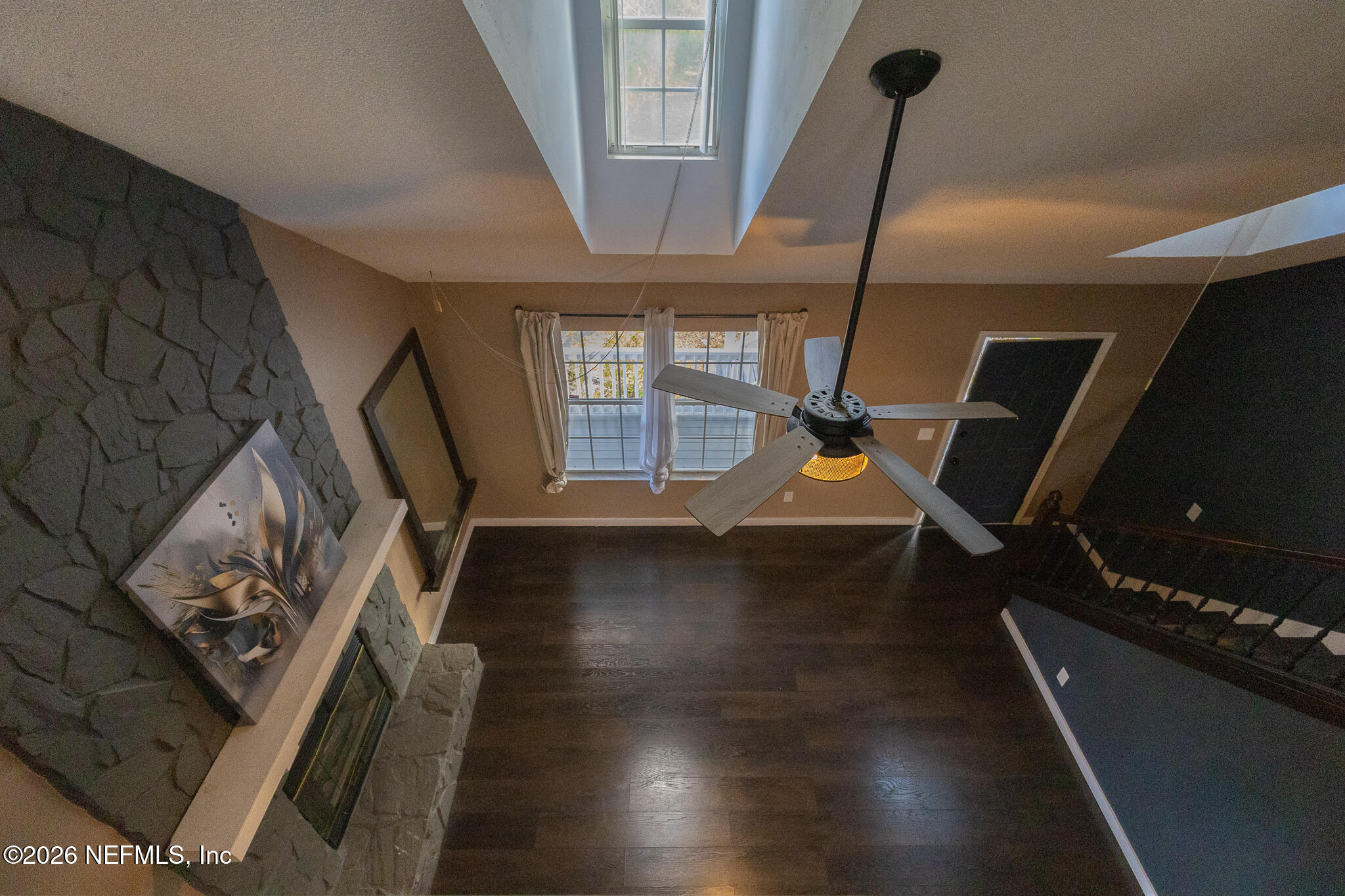 321 Paradise Circle Satsuma, FL 32189 - Photo 37 of 70 a living room with furniture and a wooden floor