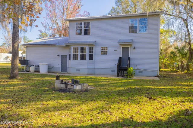 an aerial view of house with outdoor space